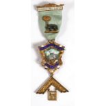 A 1956 hallmarked silver gilt and enamel Worshipful Master Masonic jewel from the Gold Coast Sekondi