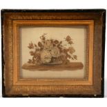 A Regency stump work embroidery shadow box depicting flowers in a basket, 33 by 29cms (13 by 11.