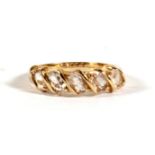 A 9ct gold dress ring set with five oval clear stones, approx UK size 'M'.