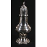 A large silver sugar caster of baluster form with pierced lid, indistinct Sheffield hallmark, 209cms