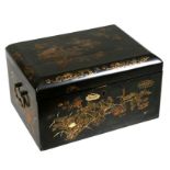 A Japanese lacquered tea box decorated with birds, insects and foliage on a deep green ground,