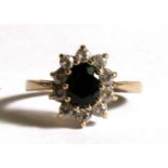 A 9ct gold sapphire cluster ring, approx size UK size 'M'.
