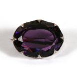 An early 20th century Charles Horner silver mounted amethyst brooch, Chester 1909, 2cms (0.75ins)