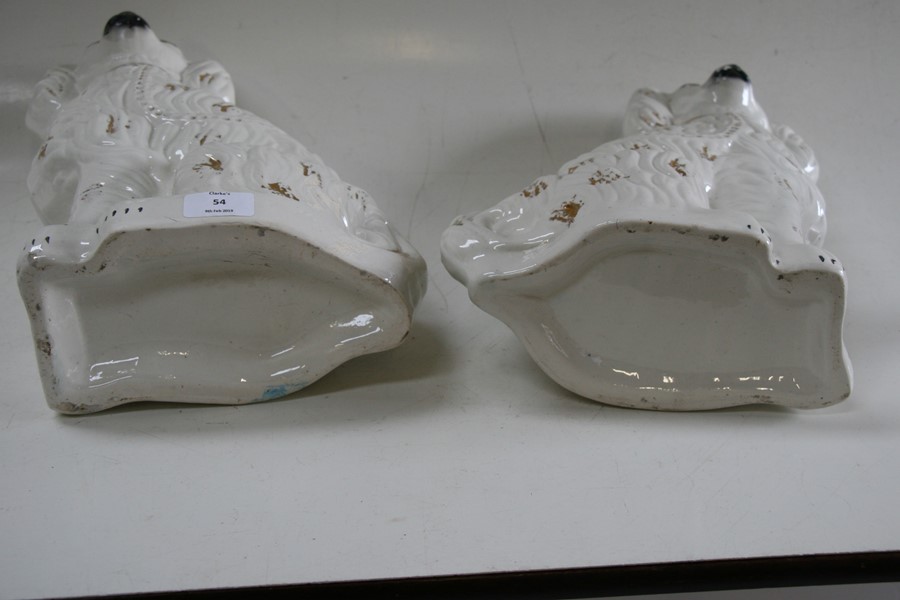 A pair of 19th century Staffordshire Spaniels, 36cms (14ins) high.Condition Report Hairline crack to - Image 2 of 5