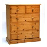 A modern pine chest of two short & three long graduated drawers, on plinth base, 90cms (35.5ins)