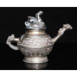 A Chinese white metal miniature teapot with dragon finial and spout, impressed mark to underside,