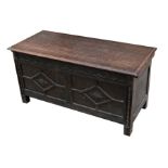 An 18th century style oak coffer, 122cms (48ins) wide.