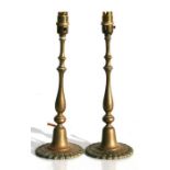 A pair of brass table lamps, 35cms (13.75ins) high.