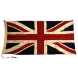 An original early 20th century cloth Union Jack flag. 66cms (26ins) by 140cms (55ins)