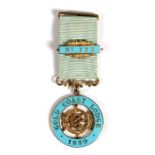 A 1959 hallmarked silver gilt and enamel Masonic Centenary Jewel from the Gold Coast Lodge No.773 of