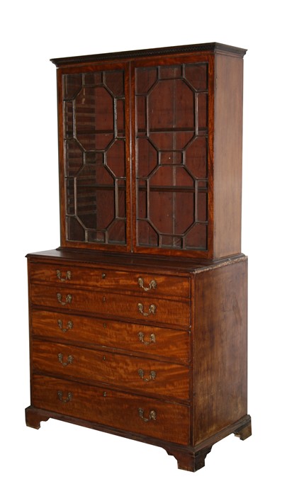 A 19th century mahogany secretaire bookcase, the astragal glazed doors enclosing a shelved interior,