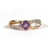 A 9ct gold amethyst and diamond dress ring, approx UK size 'M'.