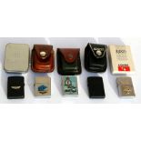 Five cased Zippo and Zippo style petrol lighters with badges to Bomber Command, RAF, USAAF, etc
