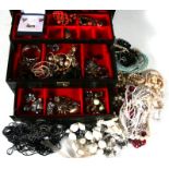 A quantity of costume jewellery to include necklaces and earrings.