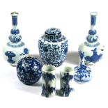 A pair of Chinese blue & white vases decorated with precious objects, 17cms (6.25ins) high; together