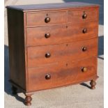 An early 19th century pine bow-fronted chest in original painted finish with two short and three