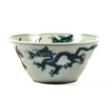A Chinese Ducai bowl decorated with dragons, six-character mark to underside, 9.5cms (3.75ins)