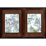 A pair of Chinese porcelain plaques depicting mountainous river scenes, framed, 26 by 35cms (10.25