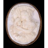 A large 9ct gold mounted angel skin coral cameo brooch depicting a young girl and an eagle, 4 by