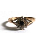 A 9ct gold sapphire cluster ring, approx UK size 'K'.