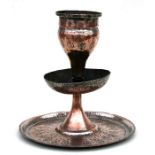 An Islamic silver on copper table centrepiece engraved with leaves, 28cms (11ins) high.