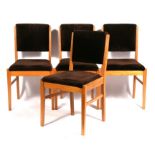 A set of four 1950's Gordon Russell of Broadway dining chairs with upholstered seats and backs (4).