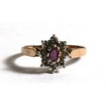 A 9ct gold cluster ring, approx UK size 'K'.