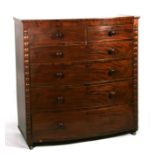 A Victorian figured mahogany bow fronted chest with two short and four graduated long drawers. 121cm