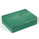 An Art Deco style green shagreen jewellery box, 18.5cms (7.25ins) wide.