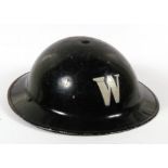 A WWII air raid warden's tin helmet, stamped to inside '1939 EC & Co. Ltd'.