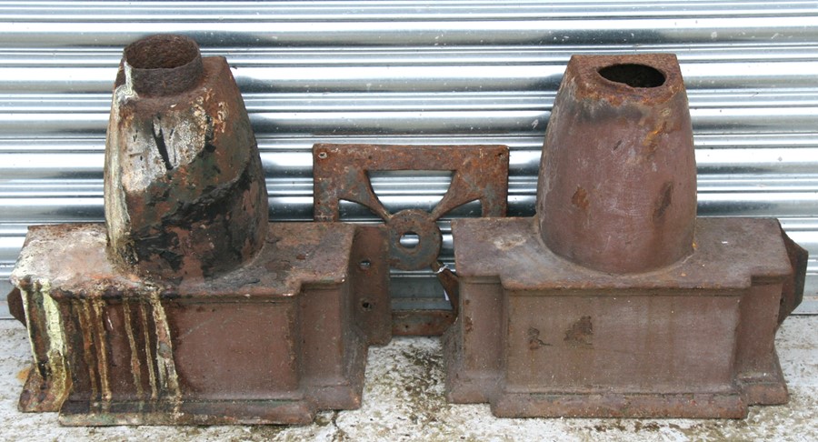 Two large cast iron rain hoppers and a piece of cast iron work. The hoppers are 48cms (18ins) wide