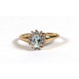 A 9ct gold aquamarine dress ring, approx UK size 'L'.