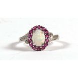 A Brooks & Bentley opal and garnet cluster ring, approx UK size 'M'.