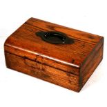 A Victorian oak spice box with sectioned interior and integral grater, 23cms (9ins) wide.