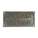 An original cast iron Auxiliary Fireman sign. 20.5cms (8ins) by 10cms (4ins)