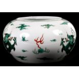 A Chinese brush washer of compressed globular form decorated with dragons chasing a flaming pear,