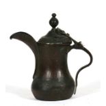 A Turkish / Islamic copper dallah coffee pot, 15cms (6ins) high.