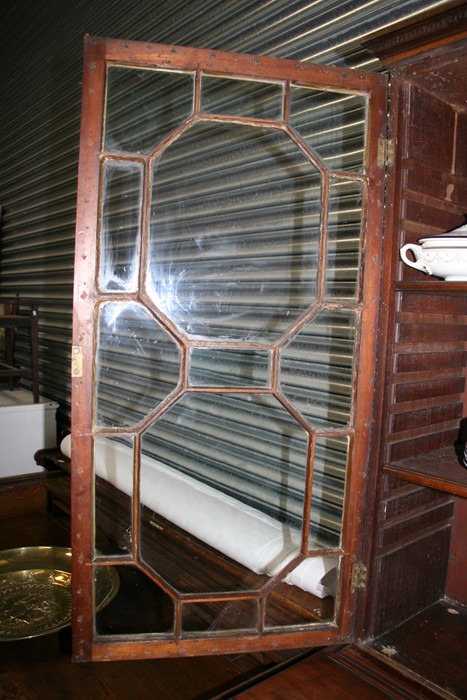 A 19th century mahogany secretaire bookcase, the astragal glazed doors enclosing a shelved interior, - Image 15 of 24