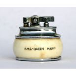 An original Rolstar table lighter from the iconic RMS Queen Mary liner.Condition ReportSome cracks