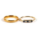 A 22ct gold wedding band, 3.3g; together with a yellow metal diamond & sapphire ring (2).
