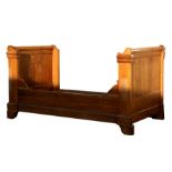 A French walnut lit en bateau small single bed, possibly a child's bed.Condition Report Inside