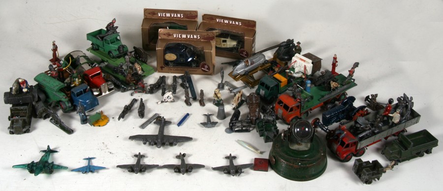 A quantity of Diecast vehicles including Dinky; together with a group of lead figures.