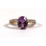 A 9ct gold & amethyst diamond dress ring, approx UK size 'N'.