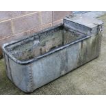 A galvanised water trough. 122cm (48ins) wide