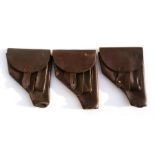 Three brown leather P64 Makarov pistol holsters