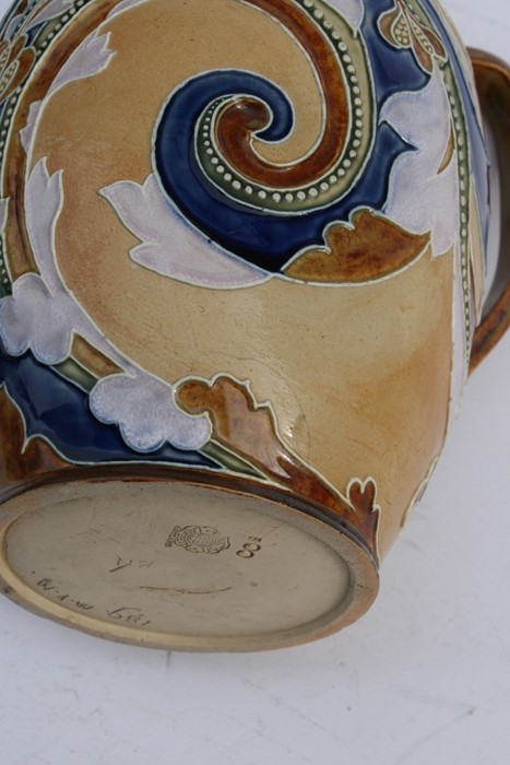 A late 19th Doulton Lambeth Mark V Marshall Design jug decorated with stylised flowers with - Image 3 of 3