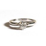 An 18ct white gold solitaire diamond ring, the diamond approximately 0.8ct, approx UK size 'L'.