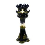 An Art Nouveau majolica jardiniere on stand, 87cms (34ins) high.Condition Report Tip of one handle