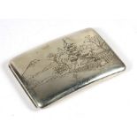 A Japanese mixed metal cigarette case engraved with a landscape, 12cms (4.75ins) wide.
