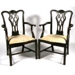 A pair of mahogany carver chairs with pierced splats, on square chamfered legs (2).